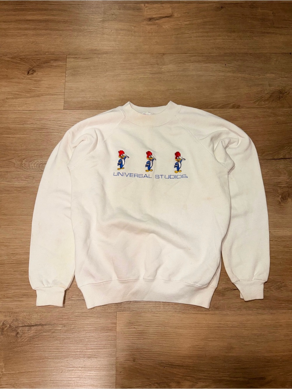 Universal Cream Crewneck Sweatshirt with Character Embroidery